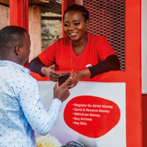 Airtel Money IPO subject image showing an agent assisting a customer