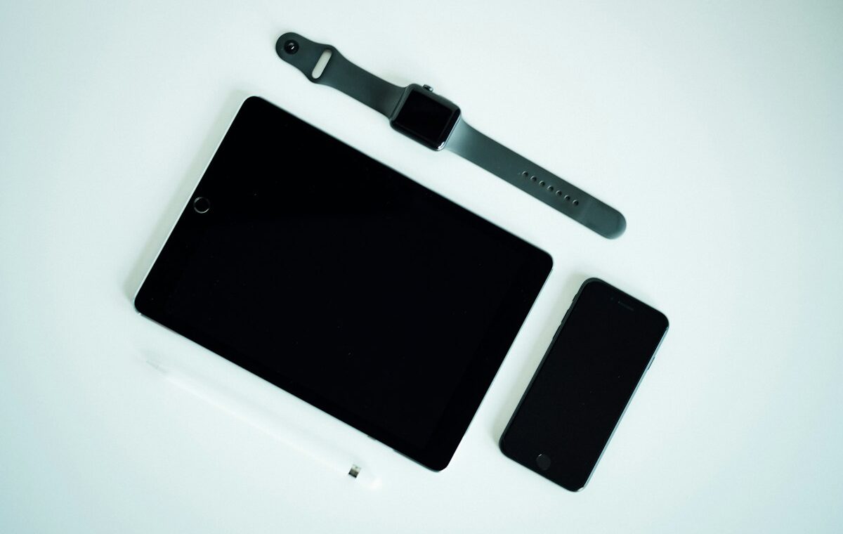 Apple devices representing App Store subscription volume purchasing for organizations