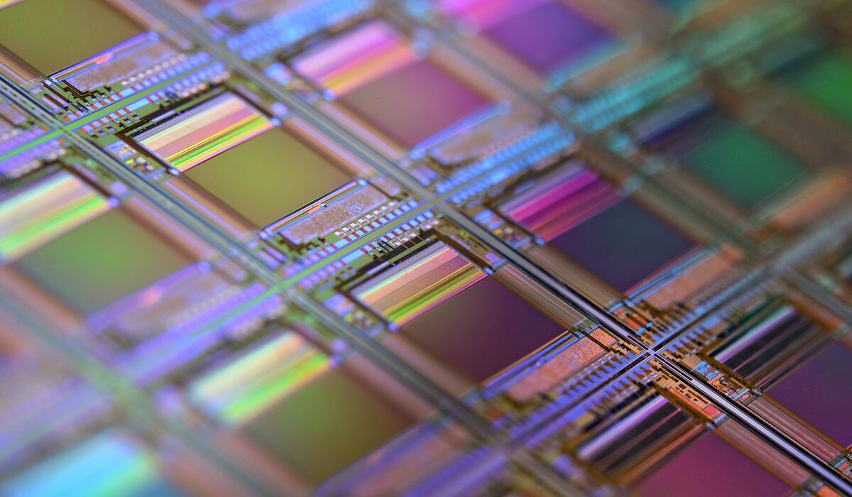 Close-up of a silicon semiconductor wafer representing Asia AI chip demand