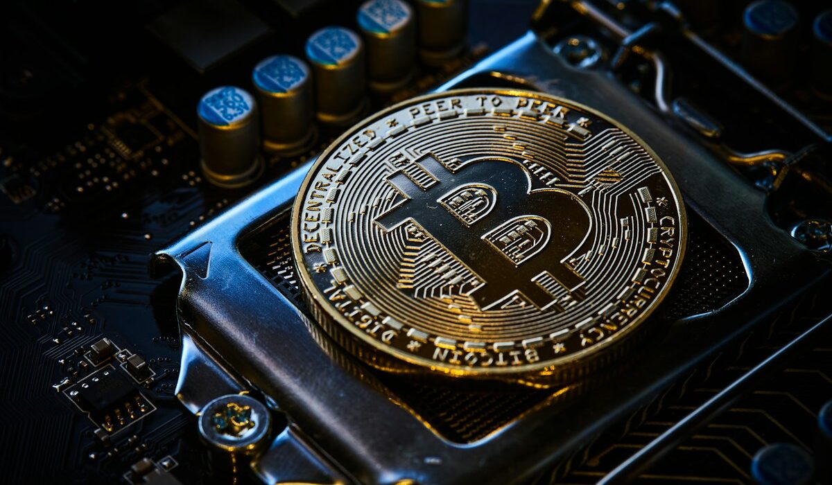 Bitcoin transaction fees represented by a Bitcoin coin on computer hardware