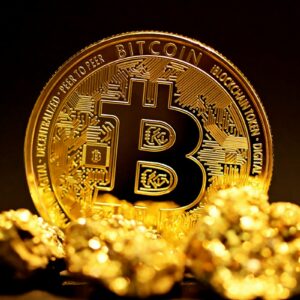 Physical Bitcoin coin illustrating the Bitcoin price outlook near $83,000