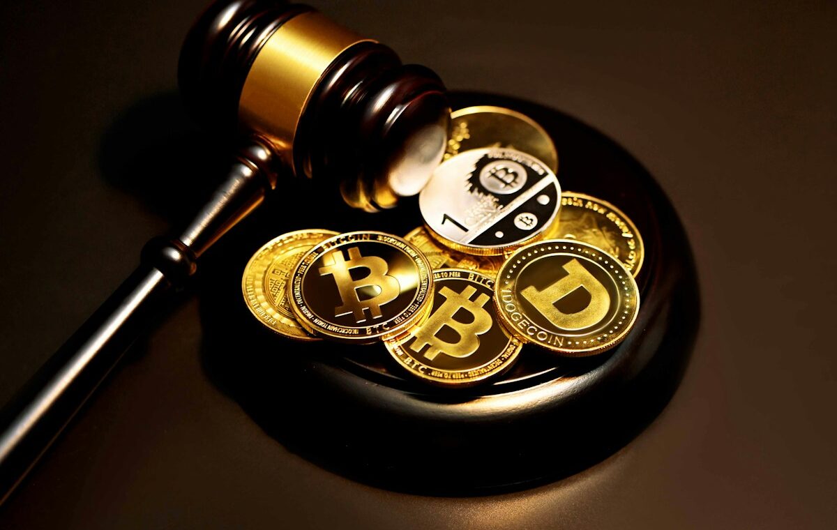 Bitcoin and Ethereum coins beside a gavel illustrating CFTC leveraged crypto rules