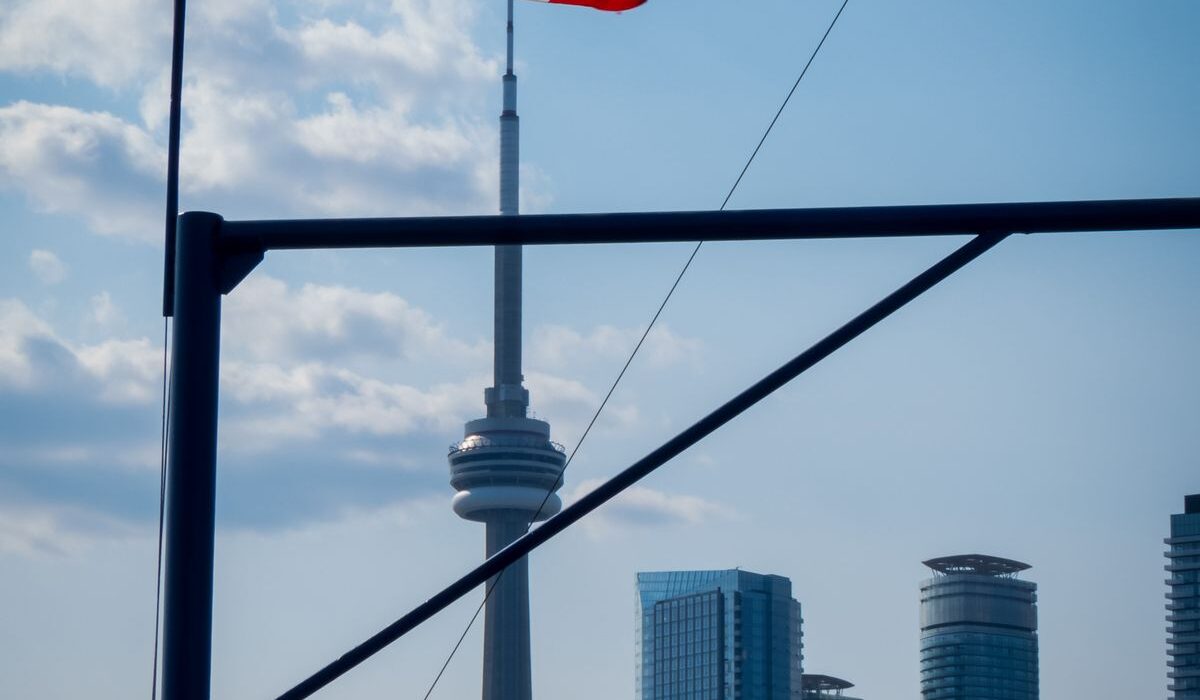 Canadian flag above Toronto skyline ahead of the Bank of Canada rate decision