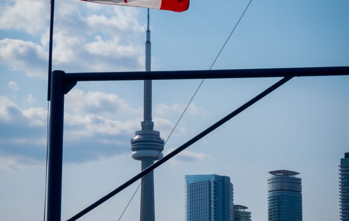 Canadian flag above Toronto skyline ahead of the Bank of Canada rate decision