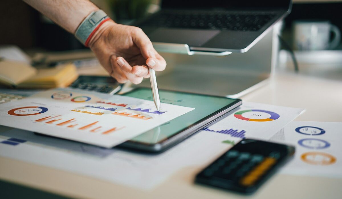 Analyst reviewing financial charts for cash conversion cycle
