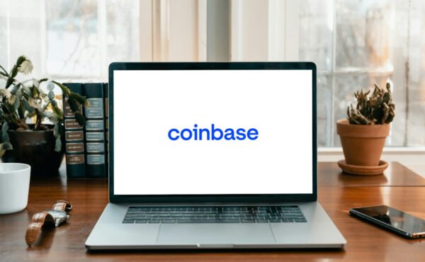 Coinbase logo displayed on a laptop ahead of the company’s Q3 2026 earnings report