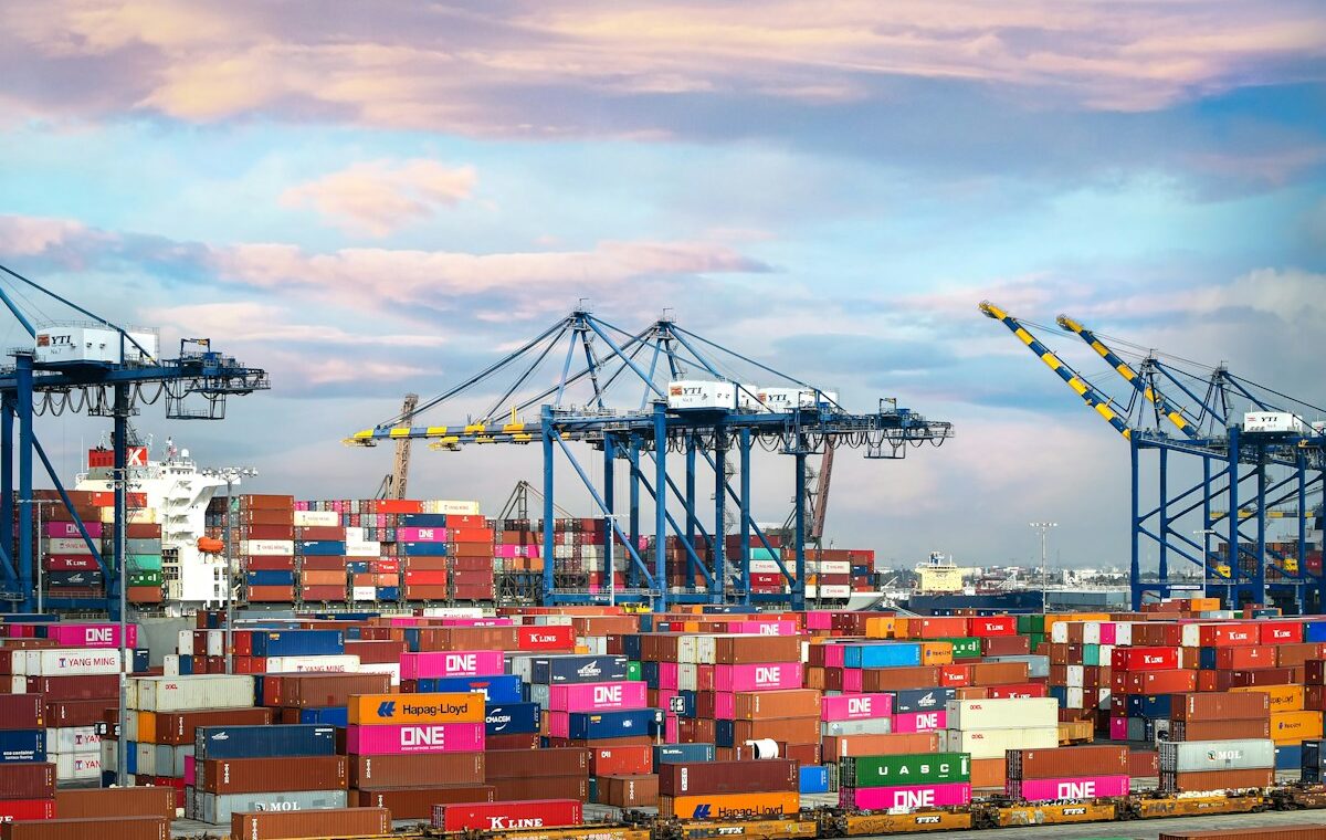Cargo containers and cranes at an international freight terminal