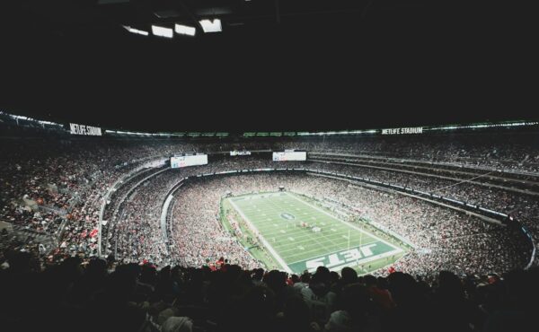 A packed football stadium illustrating the CFTC event contracts proposal. Photo by Myron Mott on Unsplash.