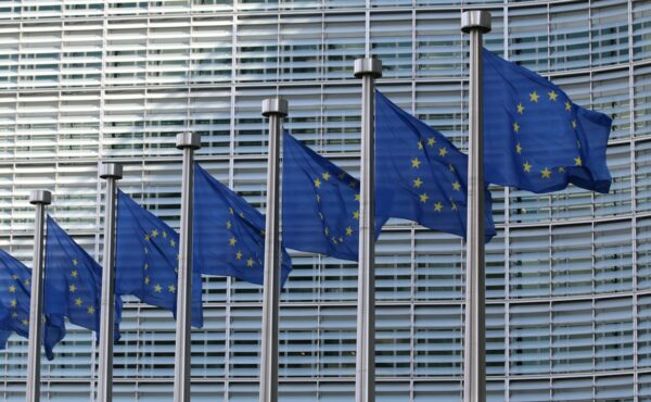 European Union flags representing euro-area repo and bond markets