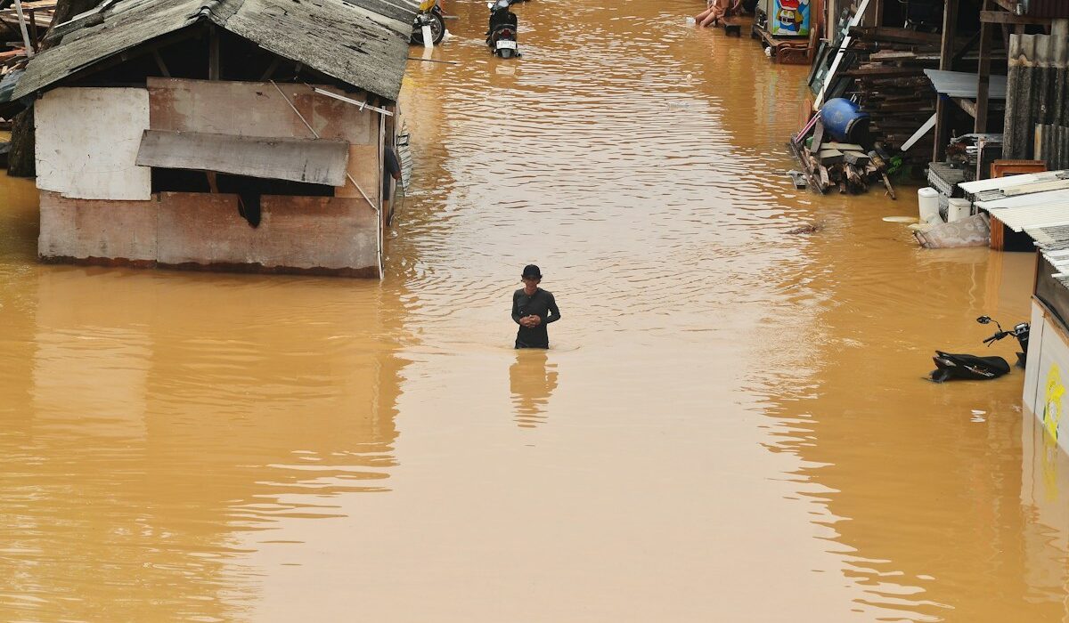 Flooded neighborhood illustrating physical climate risks considered by European bank supervisors