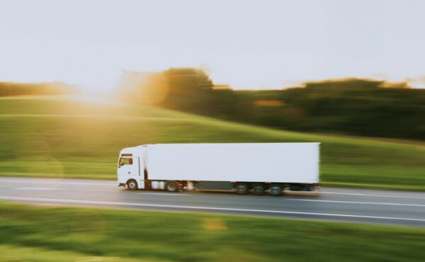 Freight truck on a highway illustrating Old Dominion earnings and LTL demand