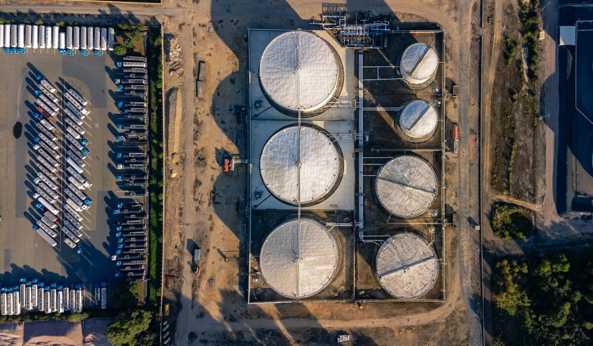 Aerial view of oil storage tanks representing the G7 emergency reserve release