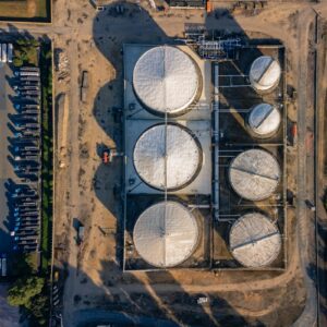 Aerial view of oil storage tanks representing the G7 emergency reserve release
