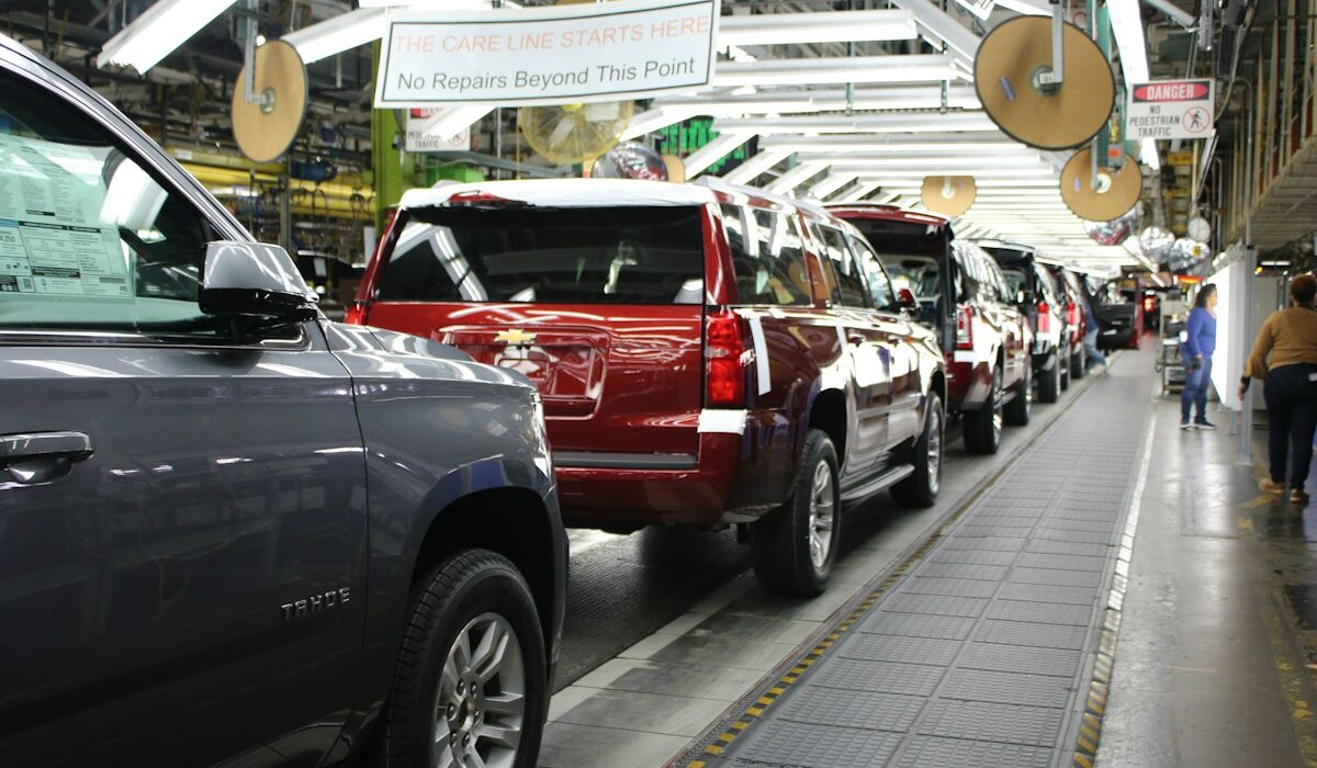 GM earnings story represented by a Chevrolet automobile assembly line