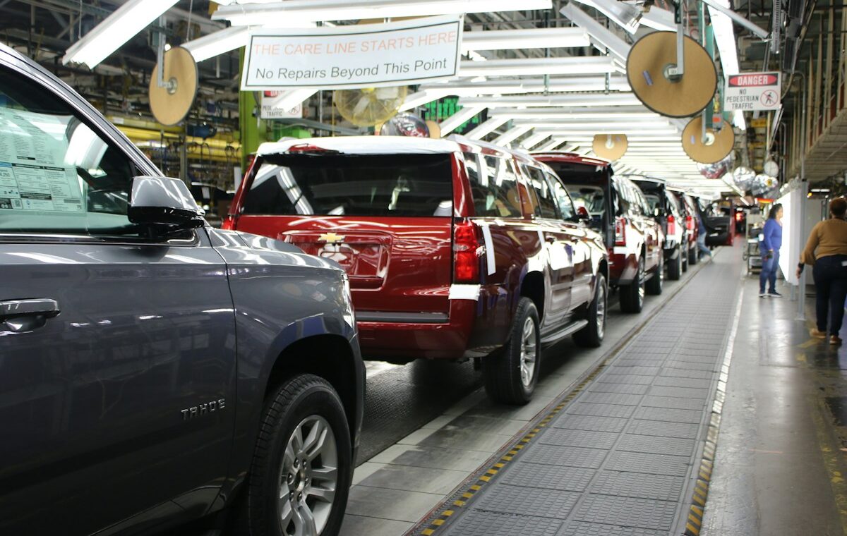 GM earnings story represented by a Chevrolet automobile assembly line