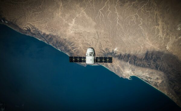Satellite above Earth representing Google Earth AI geospatial analysis