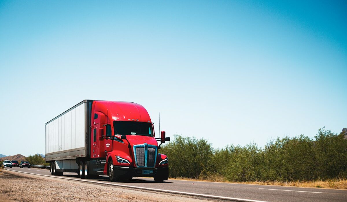 Semi truck on highway illustrating Kodiak AI driverless launch