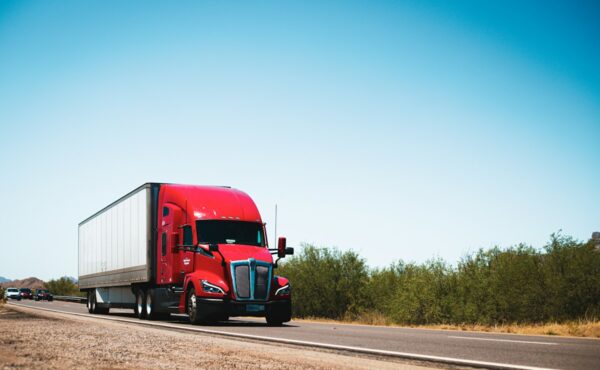 Semi truck on highway illustrating Kodiak AI driverless launch
