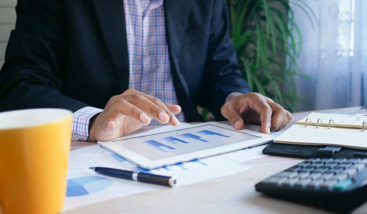 Investor reviewing a limit order and financial documents
