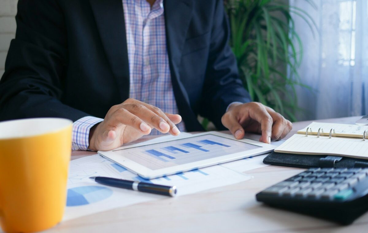 Investor reviewing a limit order and financial documents