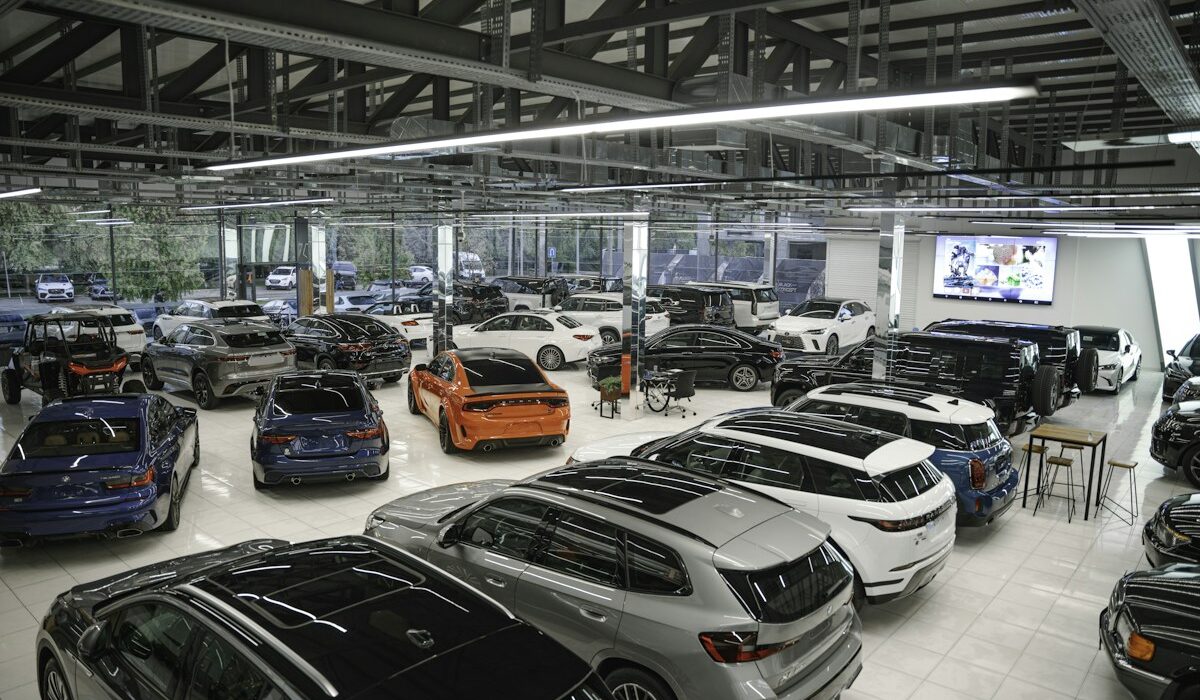 Modern vehicle dealership showroom representing Lithia revenue growth