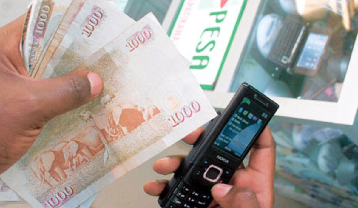 M-Pesa phone and Kenyan currency illustrating the Kenya Payment System Bill