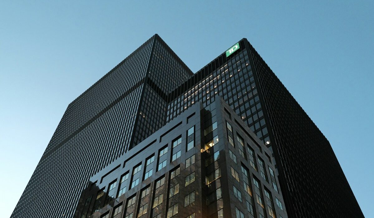 Modern commercial office towers under a clear sky
