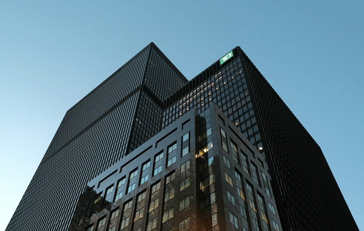 Modern commercial office towers under a clear sky