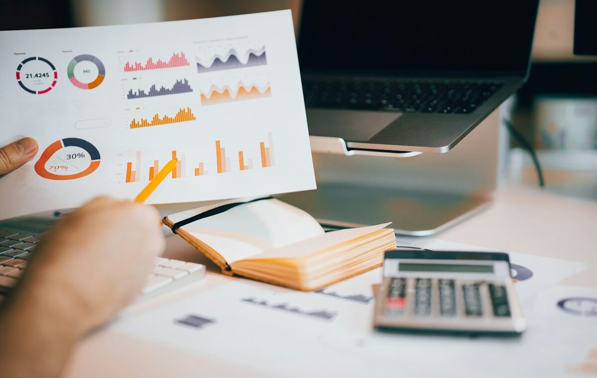 Analyst reviewing financial charts for operating margin analysis