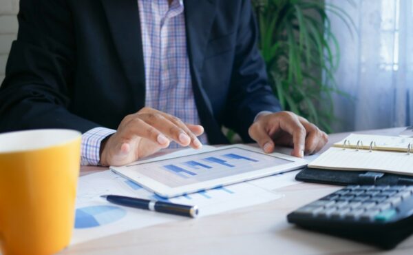 Investor reviewing financial data for a private market fund