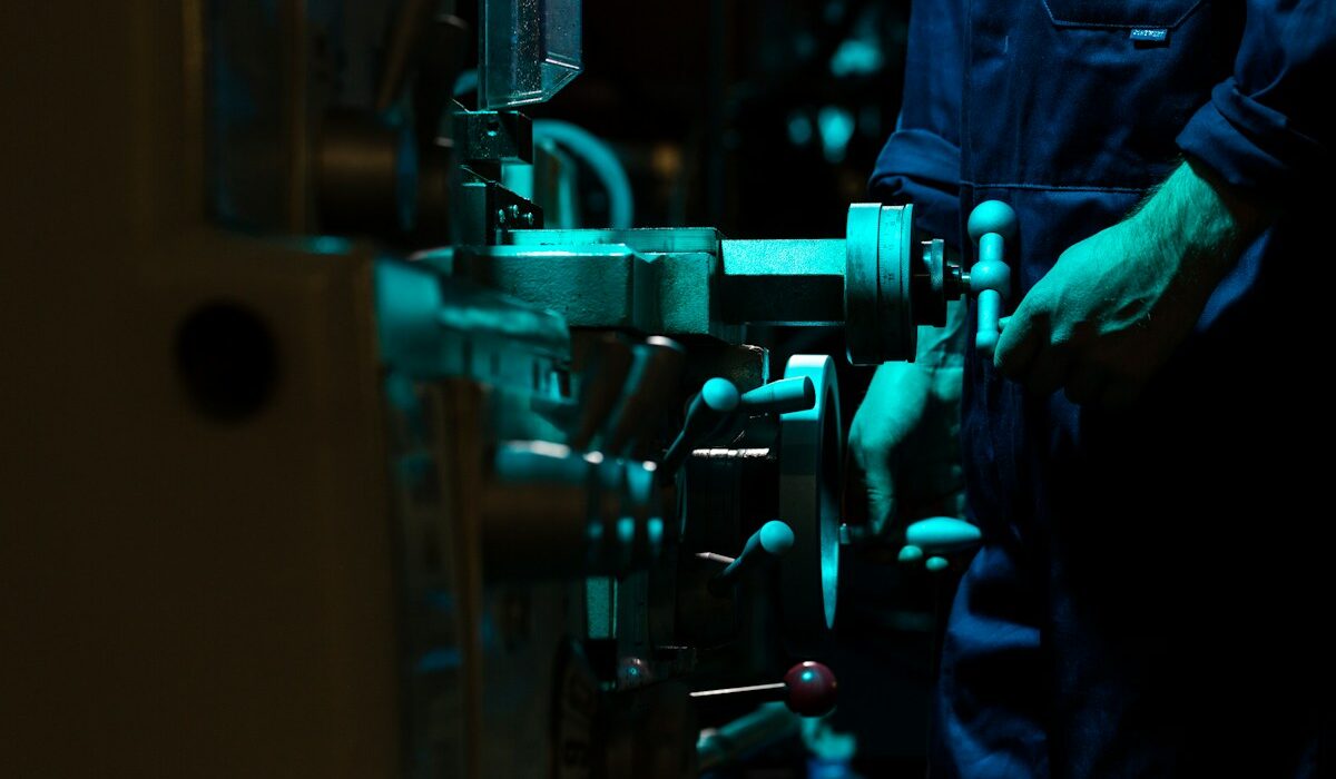 Engineer working on industrial robotics for the Schneider Electric PTC acquisition story