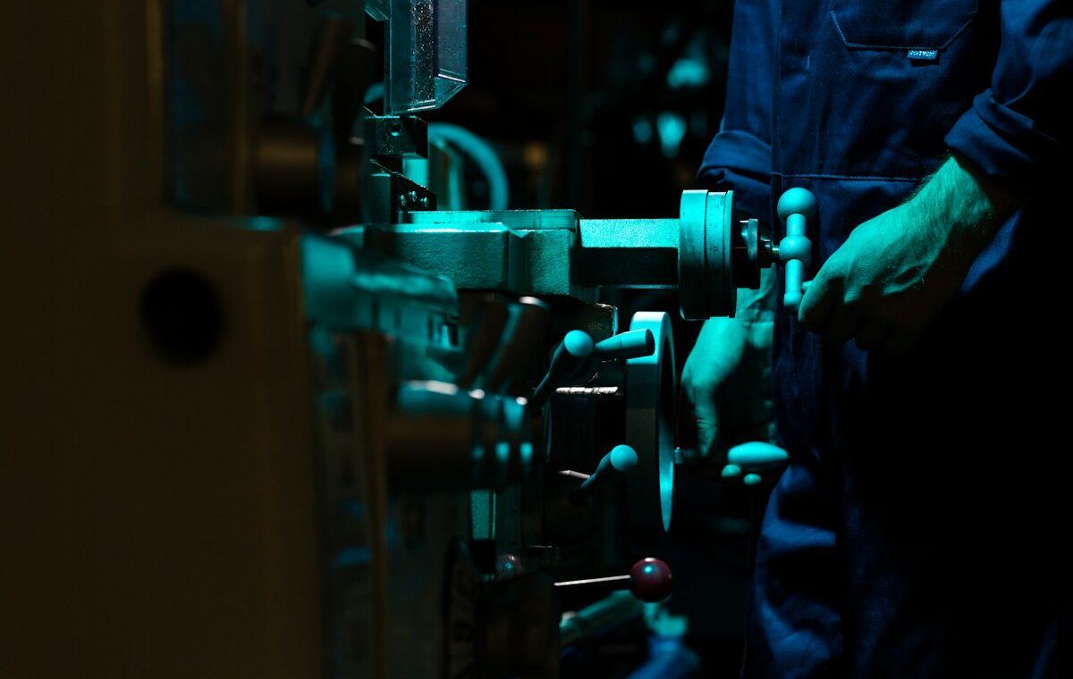 Engineer working on industrial robotics for the Schneider Electric PTC acquisition story