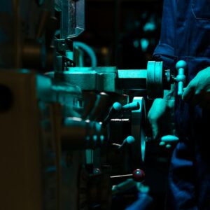 Engineer working on industrial robotics for the Schneider Electric PTC acquisition story