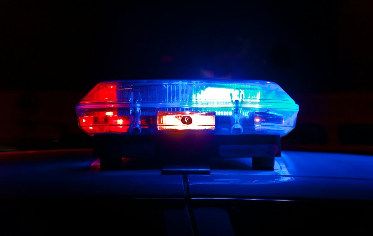 Red and blue emergency lights representing resilient public-safety 5G communications
