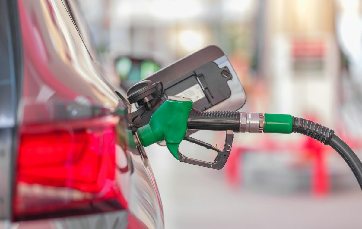Gasoline nozzle fueling a car as September CPI inflation accelerates