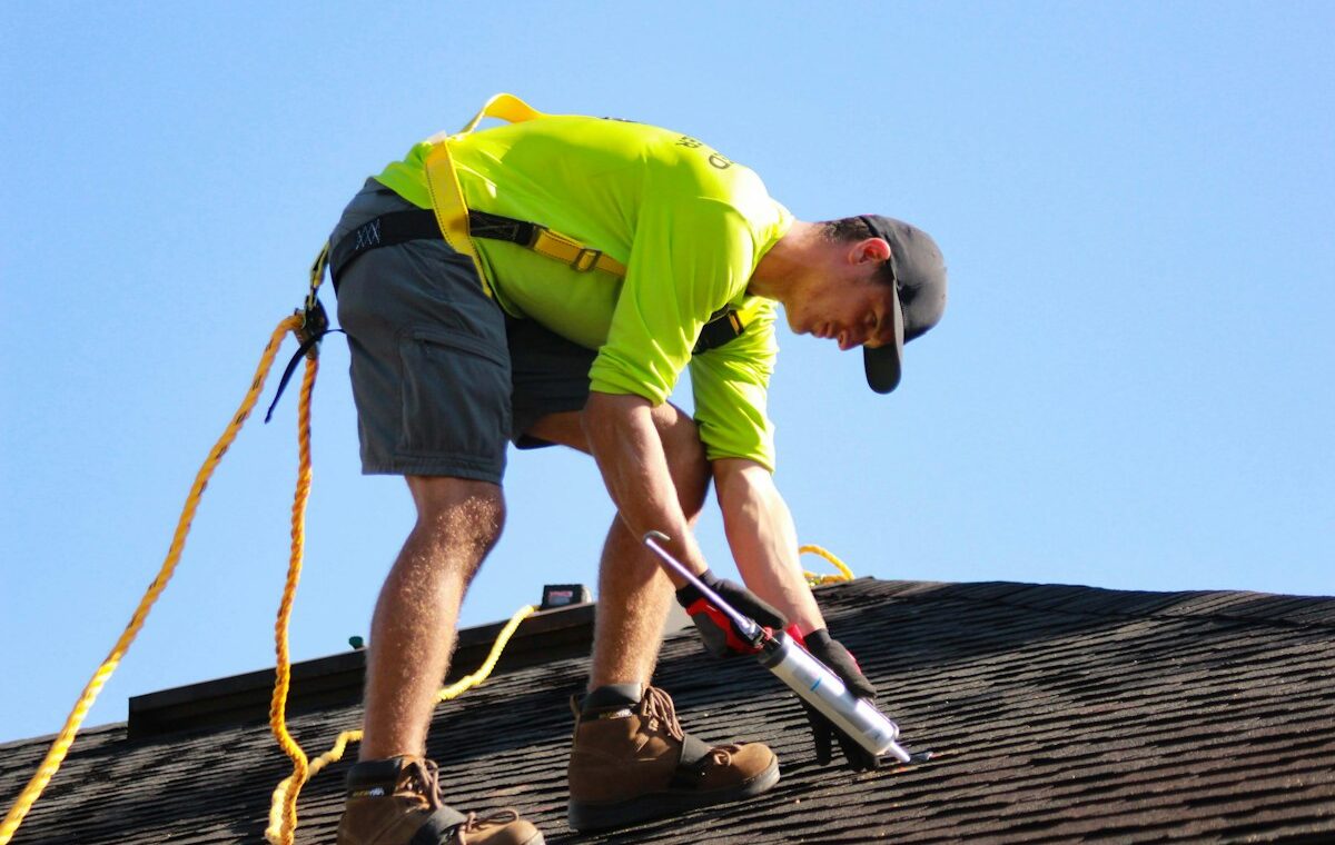 Solar energy technician working on a rooftop installation