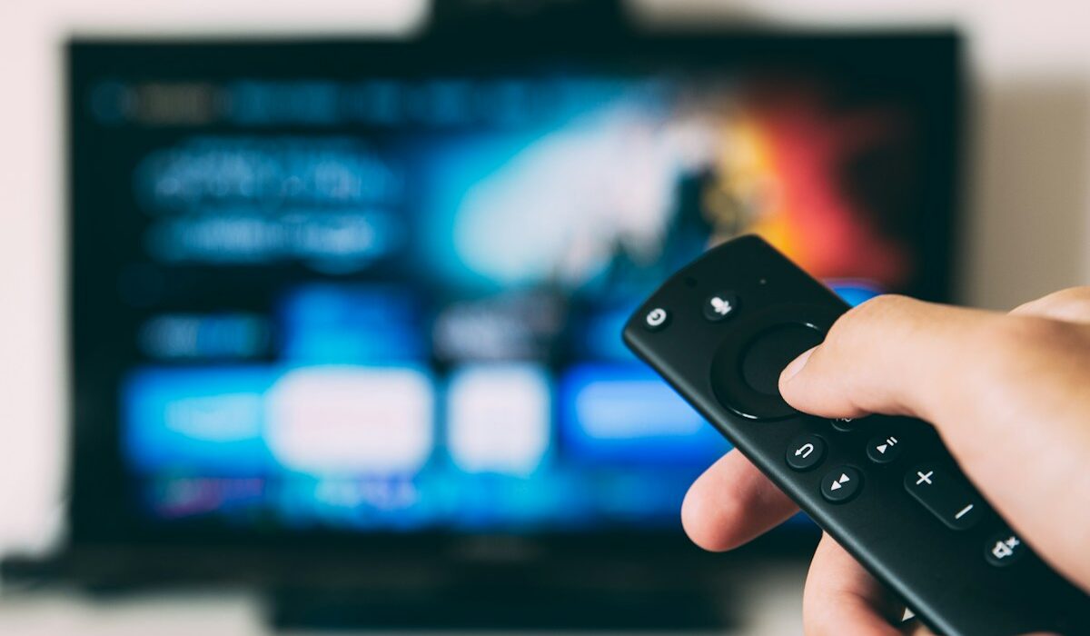 Remote control facing a streaming television screen