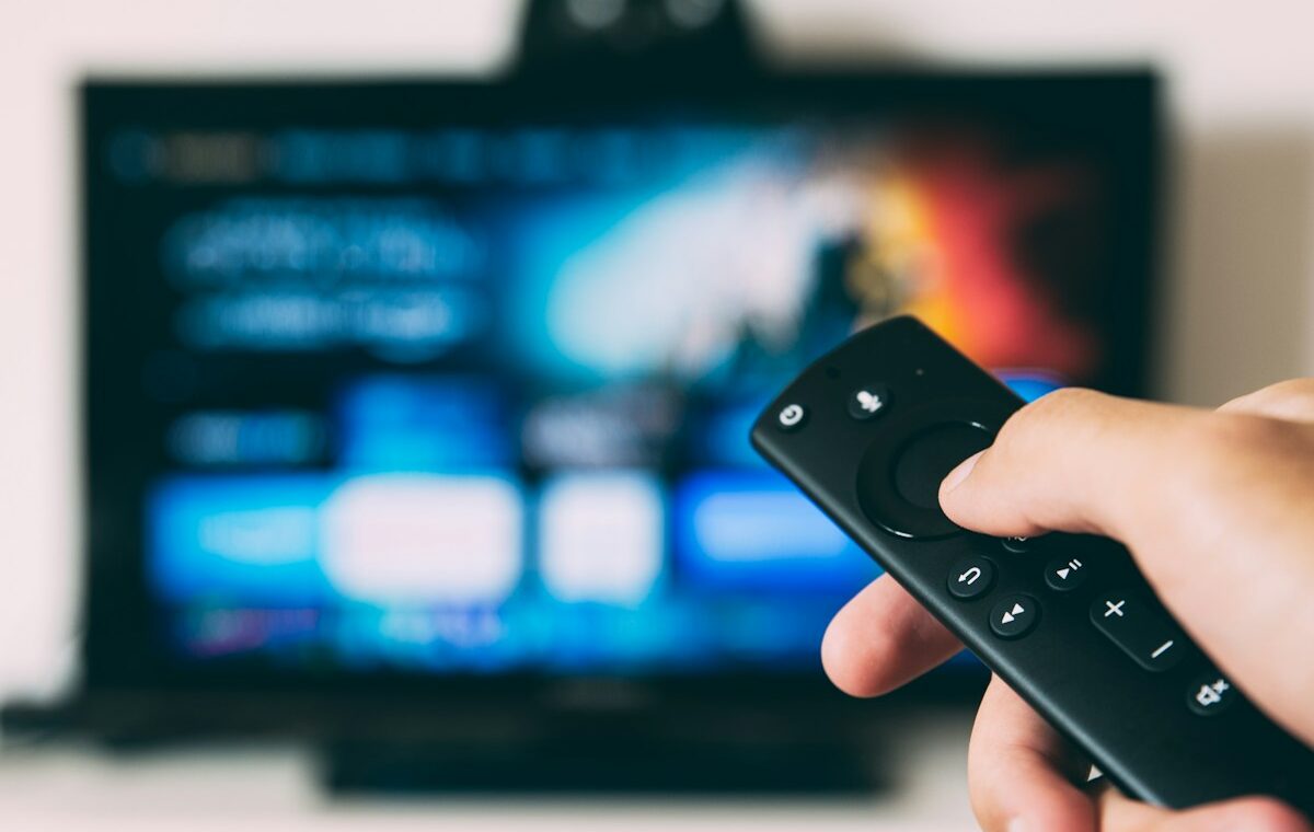 Remote control facing a streaming television screen