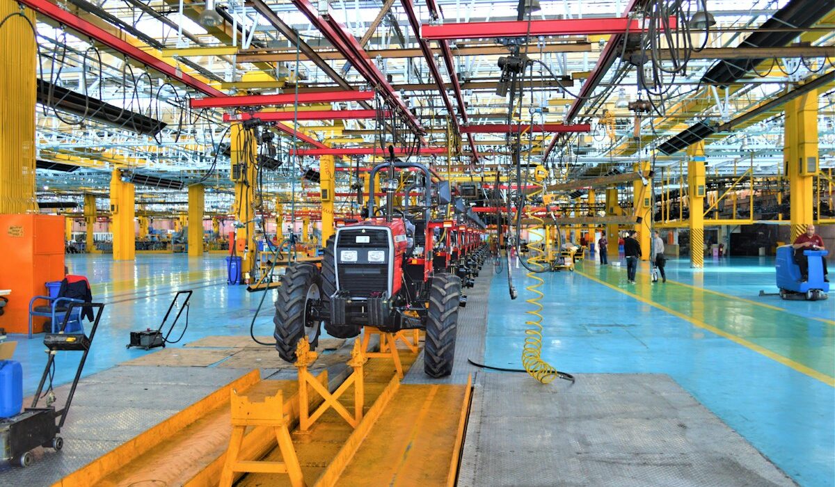 Agricultural tractors at a factory representing the FTC USDA equipment inquiry