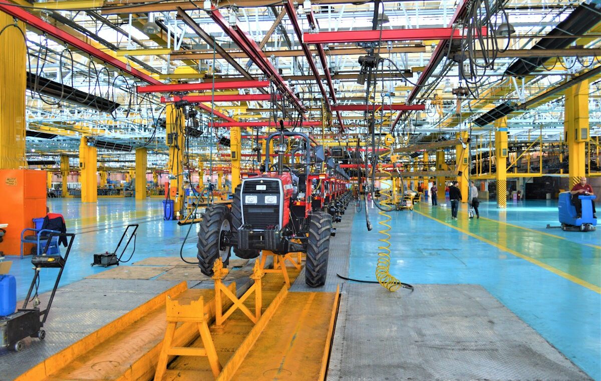 Agricultural tractors at a factory representing the FTC USDA equipment inquiry