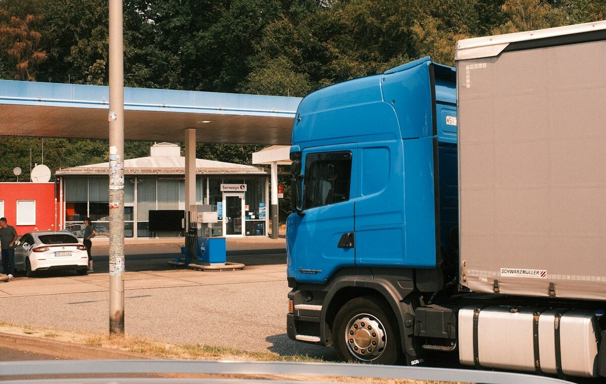 Semi-truck at a fuel station illustrating U.S. diesel tax relief